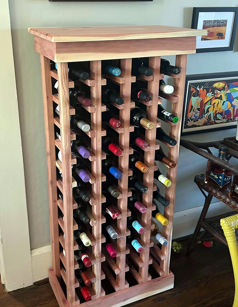 Finished cedar wine rack holding wine bottles